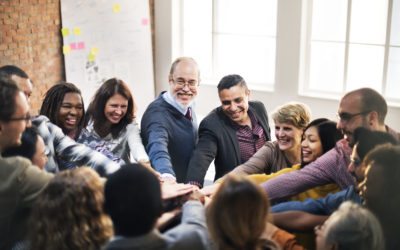 Employees being engaged during a team building event by Learn2